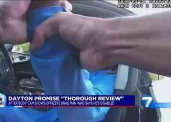 Ohio police drag the paraplegic man out of the car in body cam video