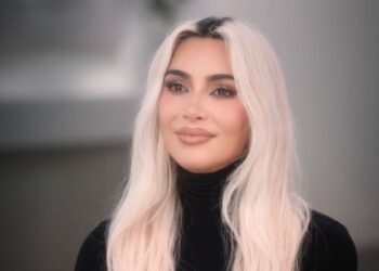 Kim and Kourtney Kardashian Spill on Childhood Fashion Feud